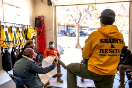 Joshua Tree Search and Rescue team members training on GPS and topographical map reading