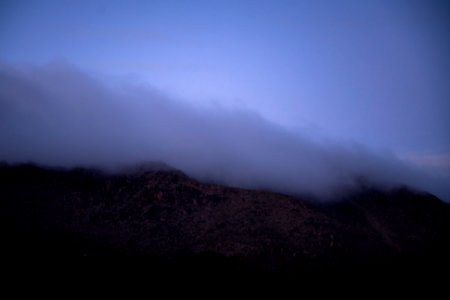Fog over Queen Mountain photo