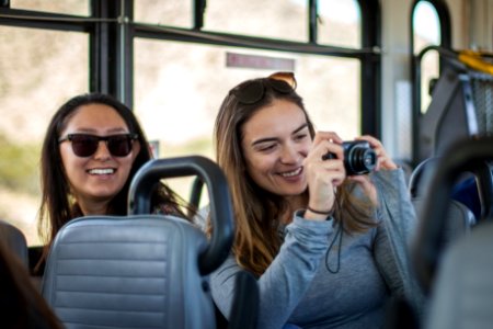 Friends enjoying the bus