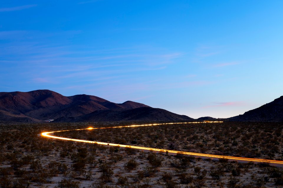 Headlights of cars exiting the park near North Entrance
