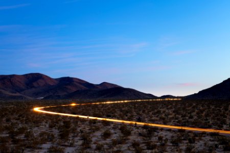 Headlights of cars exiting the park near North Entrance photo