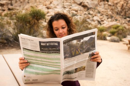 Reading the park newspaper
