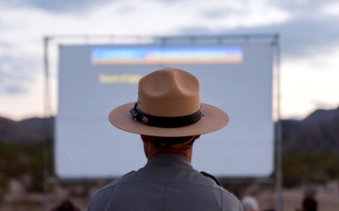 Ranger looking on during presentations at Sky's the Limit Observatory; 2015 Night Sky Festival