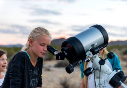 Observing the moon through a telescope; 2015 Night Sky Festival photo