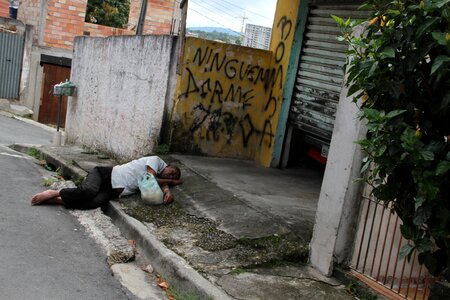 Community street without sidewalks pool of water