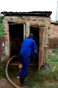 Emptying pi latrine