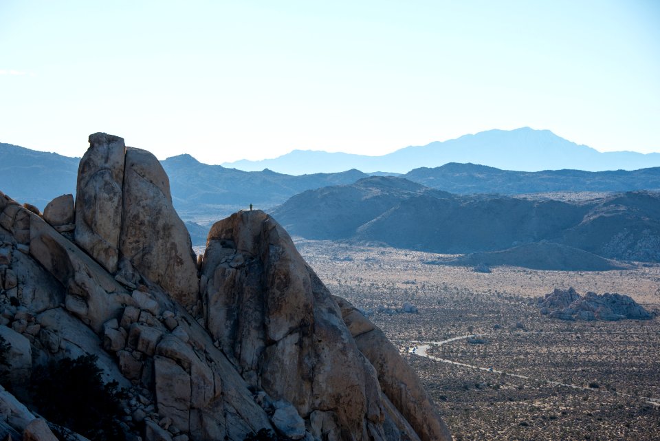 Rock climber on the Saddle from Ryan Mountain Trail