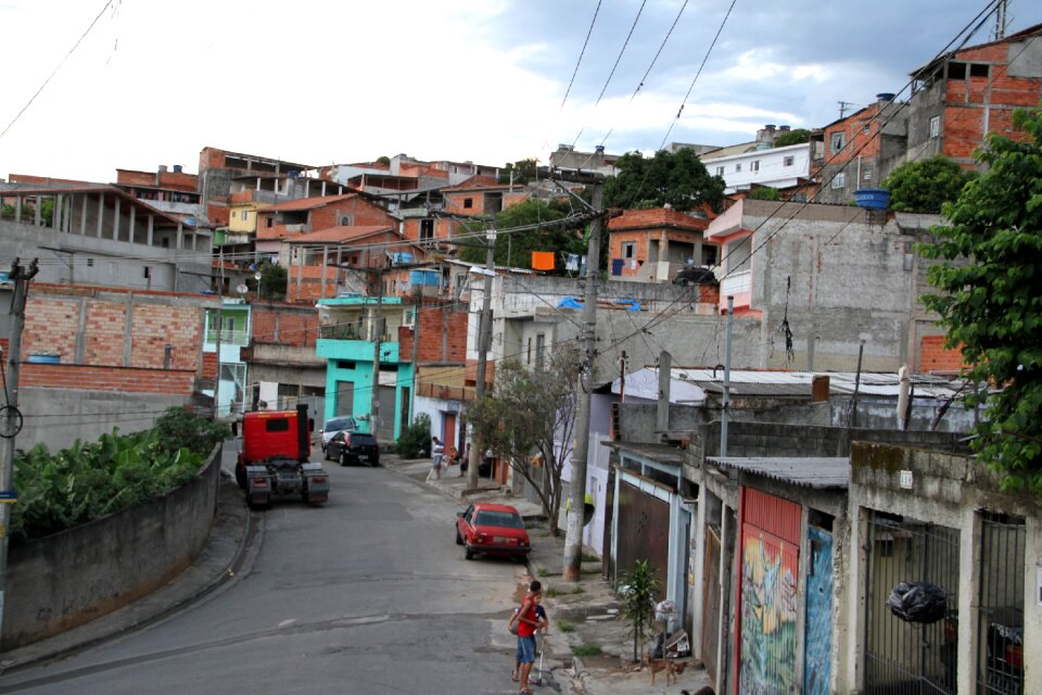Community street without sidewalks pool of water