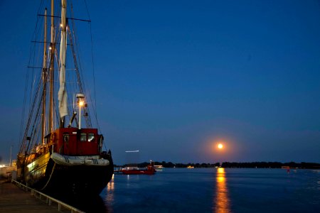 Moon rise at Toronto harbor photo