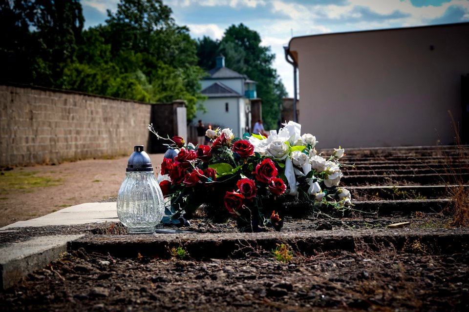 Flowers on a Jewish grave.  Sachsenhausen Concentration Camp Meuseum and Memorial.
