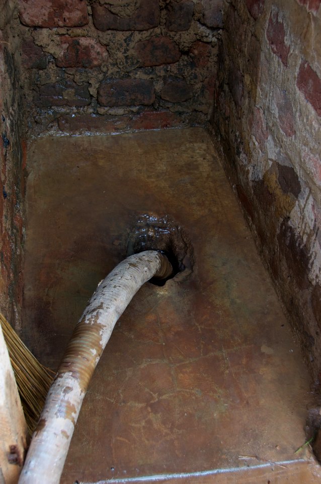 Emptying pi latrine