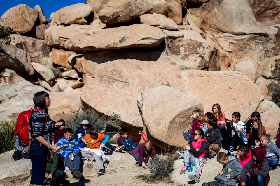 Artist in Residence Juniper Harrower with field trip photo