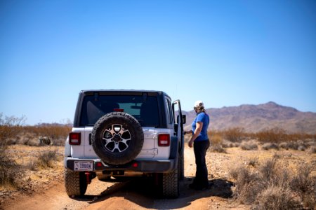 Jeep and visitor at the start of Pinkham Canyon Road photo