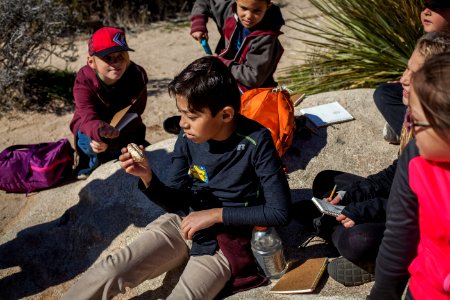 Artist in Residence Juniper Harrower with field trip photo