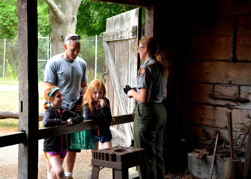 Kids at Blacksmith shop with Mary