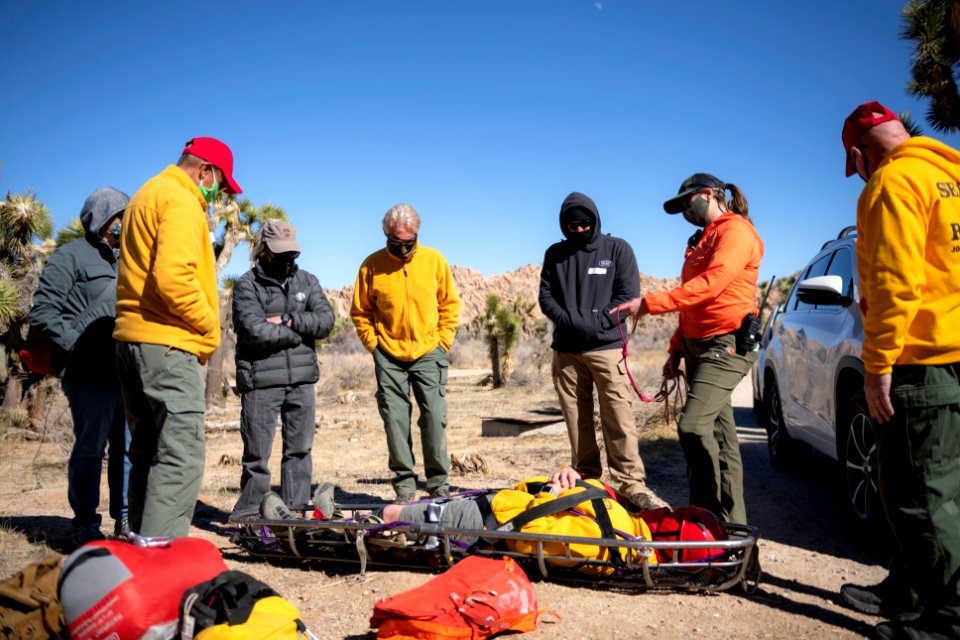 Joshua Tree Search and Rescue team members training on litter carries photo