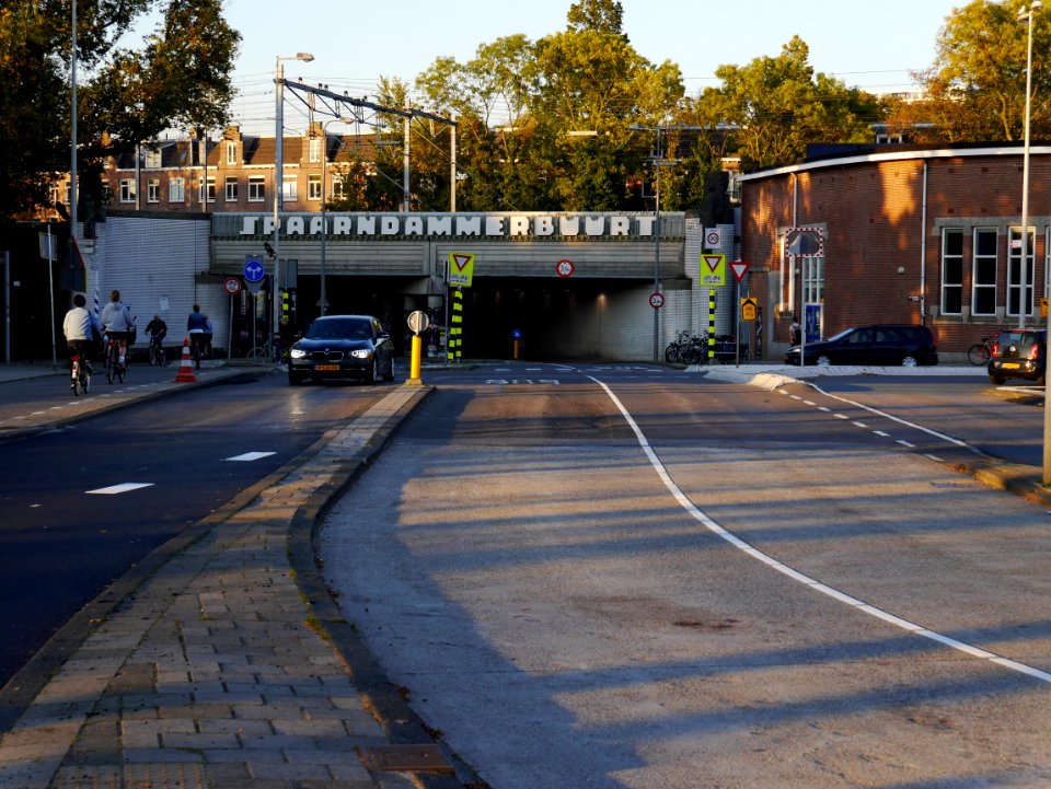 Free photo Amsterdam: picture of train-viaduct in Amsterdam City with light and shadows; free pics bij Fons Heijnsbroek - The Netherlands
