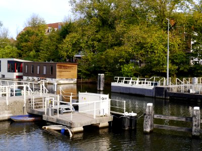 Free photo Amsterdam: picture of water locks in the canal NieuweVaart with autumn trees photo