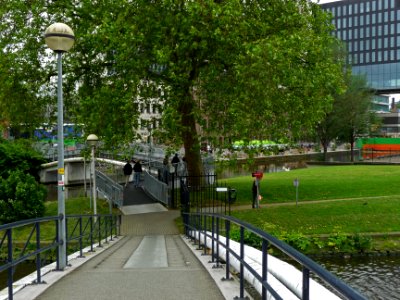 Two continuing footbridges connecting the Plantage district and Roeterseiland, university area; urban photography of Amsterdam, Fons Heijnsbroek photo
