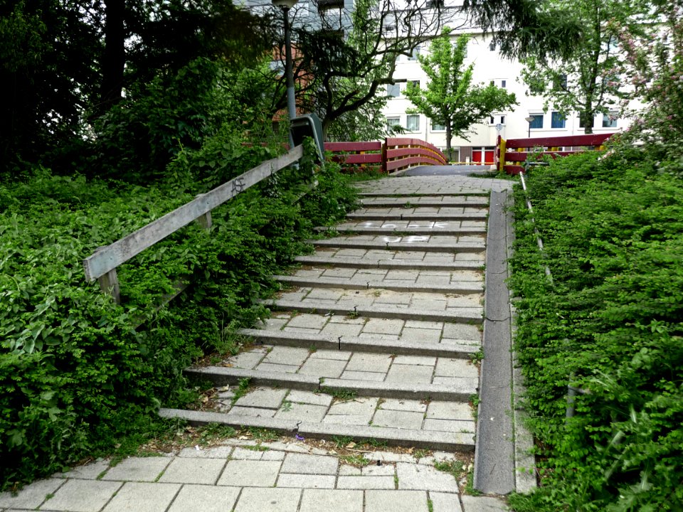 View on small stairs for pedestrians and cyclists to the bridge over the canal Ringvaart; Amsterdam East, connecting Linnaeuskade and Valentijnkade; Amsterdam city photo - urban photography Fons Heijnsbroek, 2013 photo