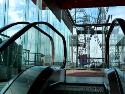 2012.08 - 'Large glass walls of the MAS / Museum aan de Stroom', with a view over the city-center of Antwerp and the old cranes, collected on the border of river Schelde - photography of modern architecture in the urban city - Fons Heijnsbroek, Belgium photo