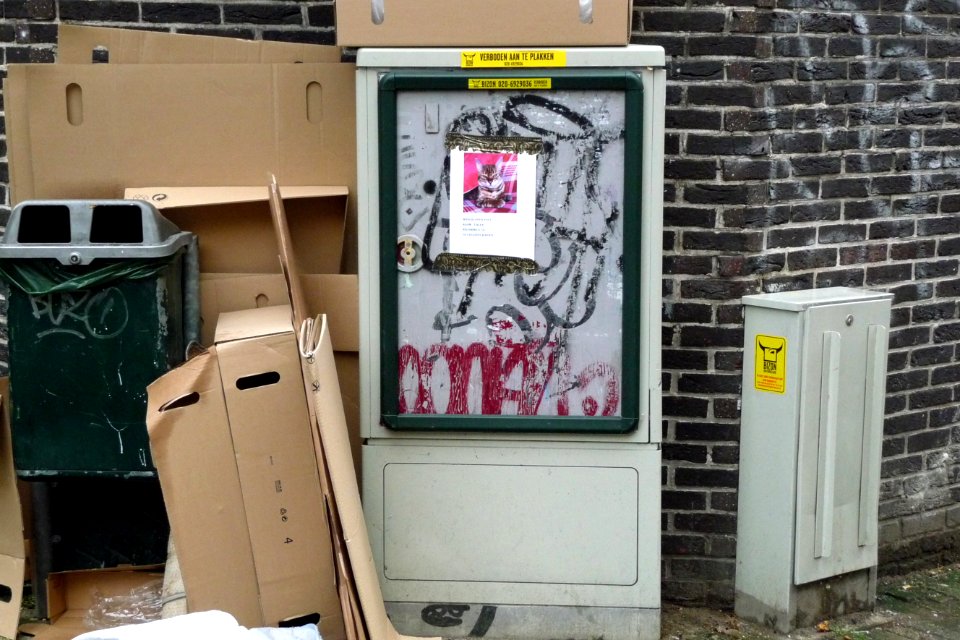 2011.05 - 'Urban street-collage art', spontaneous created with garbage and city furniture, at the Nieuwe Kerkstraat; geotag free urban picture, in public domain / Commons CCO;  city photography by Fons Heijnsbroek, The Netherlands