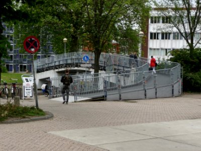 Student residences and footbridge on the campus Roeterseiland, the university area of Amsterdam city; urban photography of The Netherlands, Fons Heijnsbroek, 2013