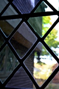 Diamond pane glaze window from front porch