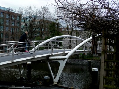 2013.04 - 'Urban photo of a foot & bicycle bridge with trees and branches', in early Spring - Amsterdam city, urban photo of The Netherlands, Fons Heijnsbroek