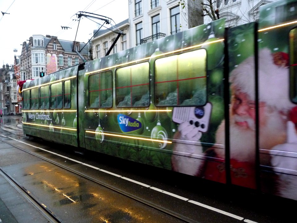 2012.12 - 'Close-up on the Christmas-tram', on Plantage Middenlaan in the Christmas days; impressionism photo in Amsterdam city; urban photographer Fons Heijnsbroek