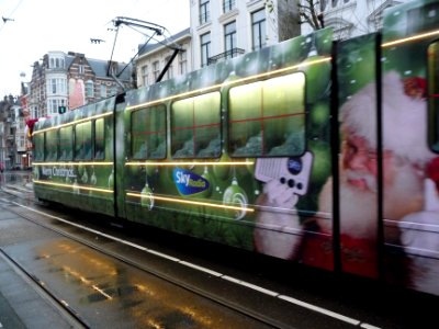 2012.12 - 'Close-up on the Christmas-tram', on Plantage Middenlaan in the Christmas days; impressionism photo in Amsterdam city; urban photographer Fons Heijnsbroek
