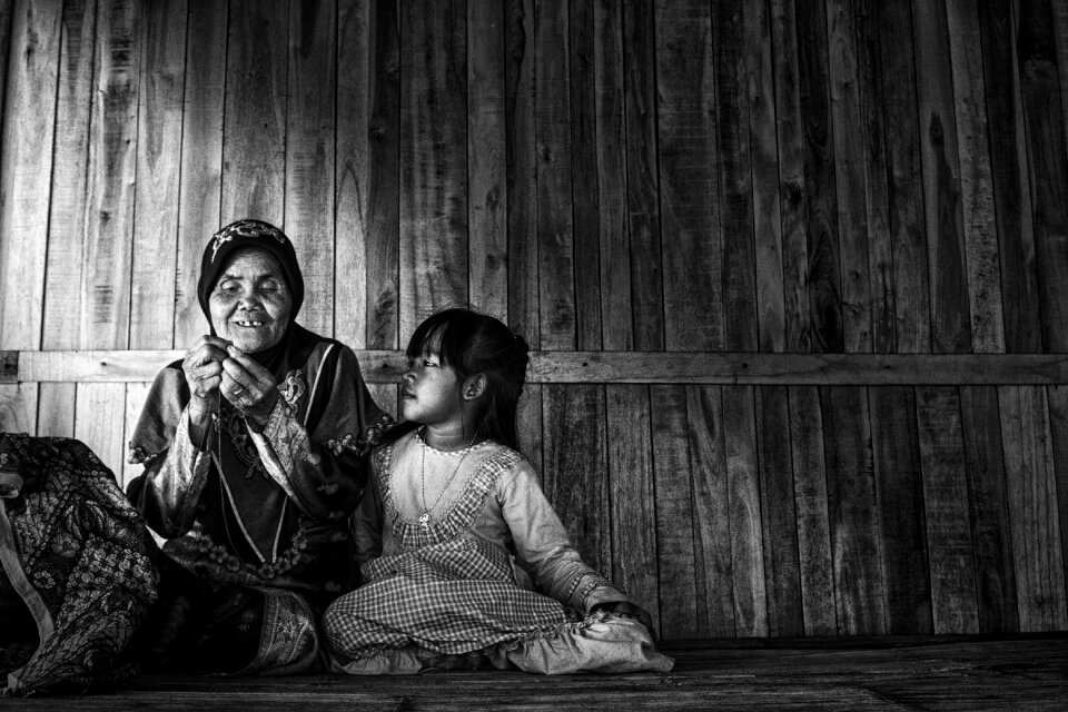 Generation grandmother sewing