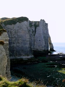 2007.09 - 'Seascape, cliffs and arch on the shore of Etretat', in Normandy France with a quiet sea; French landscape photography, Fons Heijnsbroek