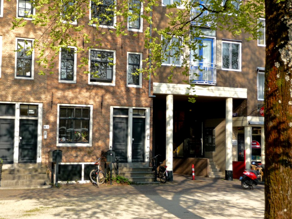 2013.04 - 'Old & modern house facades', with shadows of blossoming elm trees in Spring at the square Kattenburgerplein, on the border of the old city center of Amsterdam; urban photography, Fons Heijnsbroek