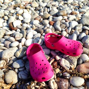 Beach slippers stones photo