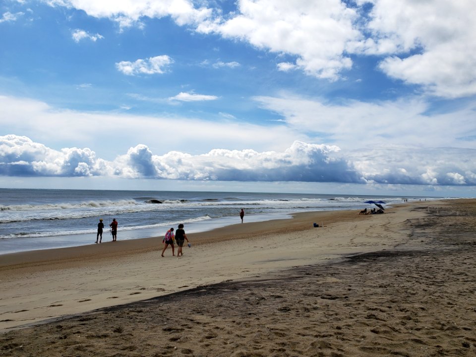 Visitors enjoying the beach