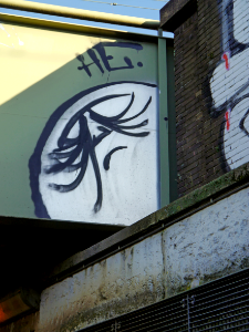 Free photo of Amsterdam: picture of a graffiti wall-face under the train-viaduct, The Netherlands