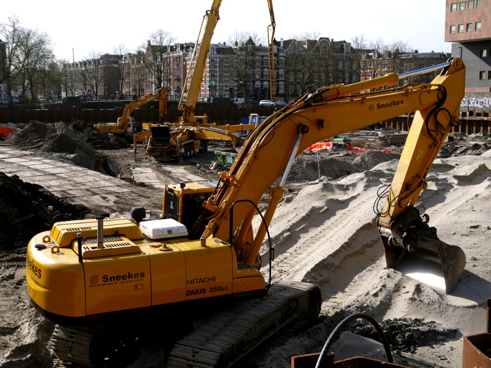 2014.03 - Excavation site with cranes, diggers and building equipment, along the canal water; a geotagged free urban picture, in public domain / Commons CCO;  city photography by Fons Heijnsbroek, The Netherlands
