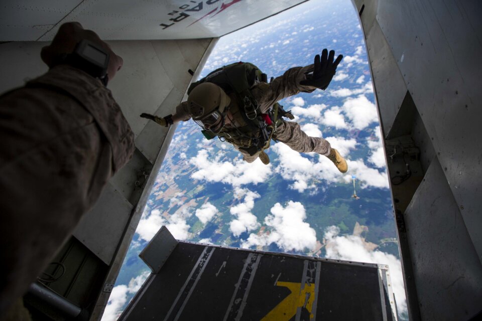 Helicopter falling parachuting