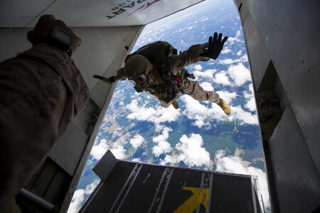 Helicopter falling parachuting
