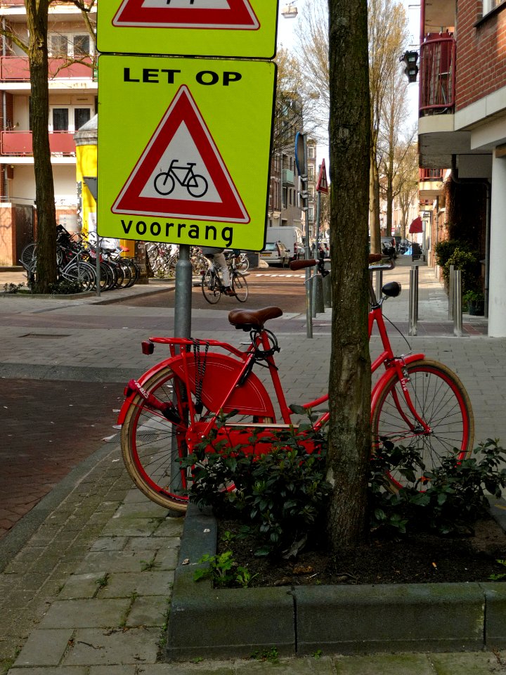 2015.04 - Amsterdam photo of signs - a combination of red colors in a street view in city-district de Pijp; a geotagged free urban picture, in public domain / Commons CCO;  city photography by Fons Heijnsbroek, The Netherlands