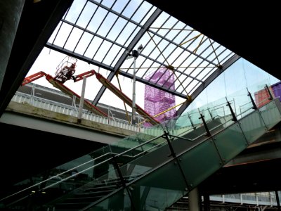 2011.06 - 'A view from below on the bowed glass-roof', over the new-built bus-station, behind Central Station Amsterdam - including colored glass letters in the roof - east-side of the station; urban photography, Fons Heijnsbroek photo