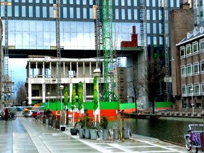 2013.04 - 'A photo of the construction-site of the main university building  and gate', campus Roeterseiland in Amsterdam city; canal is Nieuwe Achtergracht under the gate, to the left Crea-student-cafe; - urban Dutch photography, Fons Heijnsbroek