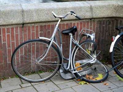 Demolished bicycle on the bridge at the end of Kinkerstraat, district Oud-West, in Amsterdam city; urban photography in the Netherlands, Fons Heijnsbroek, 2013