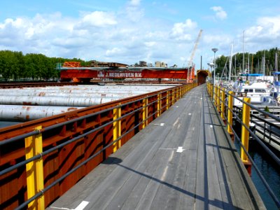 2007.08 - 'A view over the walking-path aside' of the construction pit of the subway tunnel alongside the canal; with rolling work platform; location on the North side of Amsterdam; Dutch city photo + geotag, Fons Heijnsbroek, The Netherlands photo