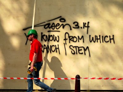 2015.04 - Amsterdam photo of street-art and a workman, A wall-writing & shadows on the wooden construction-fence in the street Keizersgracht; a geotagged free urban picture, in public domain / Commons CCO; city photography, Fons Heijnsbroek, Netherlands photo