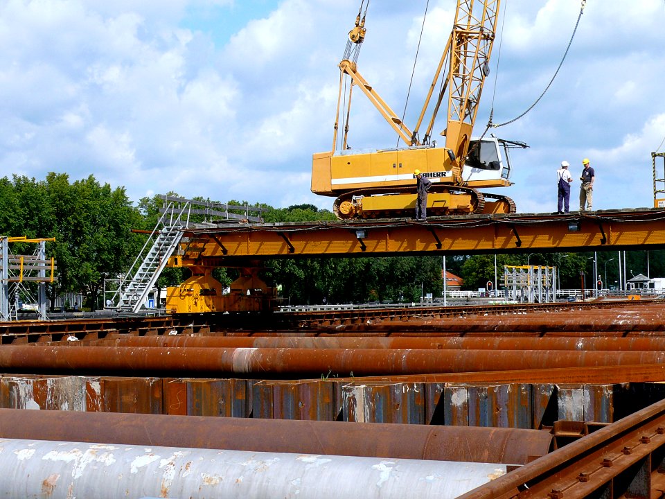 2007.08 - 'View over the metro construction site' underground with the rolling work platform including building crane overhead; on the North side of Amsterdam; Dutch city photo + geotag, Fons Heijnsbroek, The Netherlands photo