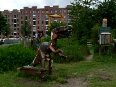 2013.06 - 'Metallic outdoor dragon sculpture', in a guerrilla city-garden, near Artis Zoo, on the Plantage Kerklaan; photo Amsterdam city in Summer; Dutch photographer Fons Heijnsbroek