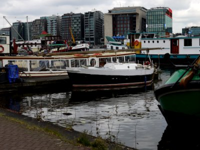 2013.06 - 'Cityscape, ships & boats at the quay of the water Oosterdok / Docklands, in Amsterdam city; modern architecture photography by Fons Heijnsbroek, the Netherlands photo