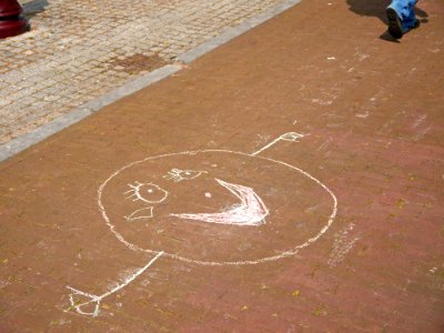 2015.04 - Amsterdam photo of street-art - A child's drawing Smiling Face, in white crayon on the pavement, in the Plantage district; a geotagged free urban picture, in public domain / Commons CCO; city photography by Fons Heijnsbroek, The Netherlands photo